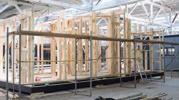 The frame of the new modular house. Construction of new and modern prefabricated modular house from composite wood panels video