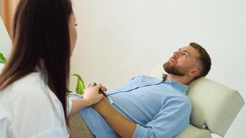 Depressed man on reception at psychologist. Medical concept with psychologist visit video