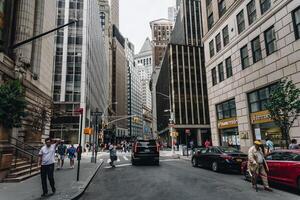 New York, US - May 12, 2023 - Wall Street distric in New York during the working day photo