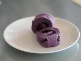 yam roll sweet food in white plate photo