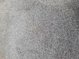 Gray beach sand background can be used for wallpaper or graphic design. photo