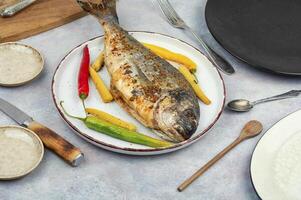 Baked dorado fish. photo