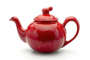 A red ceramic teapot isolated on a white background. photo