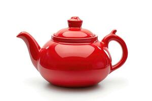 A red ceramic teapot isolated on a white background. photo
