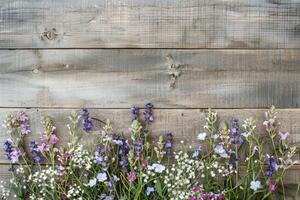 Rustic small flower bouquet with empty space on top. photo