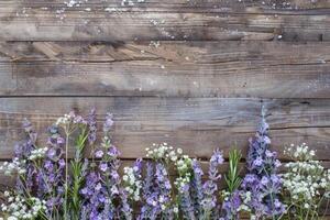 Rustic small flower bouquet with empty space on top. photo