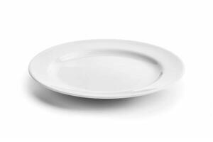 A white ceramic plate isolated on a white background. photo