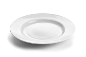 A white ceramic plate isolated on a white background. photo