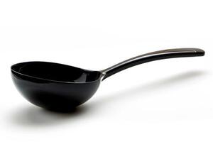 Black plastic soup ladle on a white background. photo