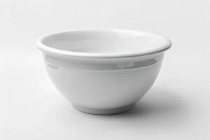 White ceramic mixing bowl on a white background. photo