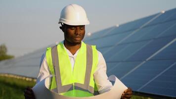 Young Black Engineers Open Drawing Blueprint Paper and Check Quality of Installing Solar Photovoltaic Panels video