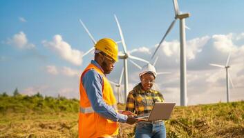 Engineers Using Digital Technology to Monitor Wind Turbine Maintenance.Generated image photo