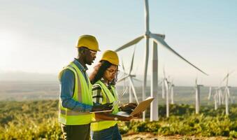 Engineers Using Digital Technology to Monitor Wind Turbine Maintenance.Generated image photo