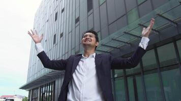 A business man represents success and satisfaction in achieving success in business and investment. video
