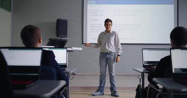 Charismatic Teen Boy Student Speaking In Classroom, Lesson Of Computer Science And Programming video