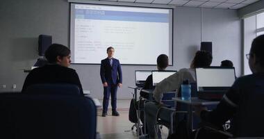 Public Speaking In Classroom, Boy Presenting Project In Programming Courses, Talk With Classmates video