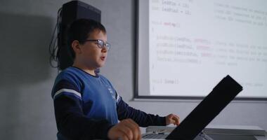 Genius Teen Boy Talking About New Software And Computer Program In Classroom, Portrait video