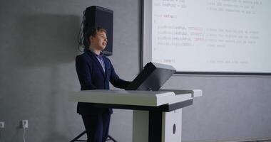 Smart Teen Boy Presenting Computer Science Project In Classroom, Future Programmer video