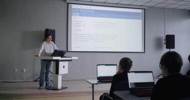 Programming And Coding Lesson In School For Gifted Children, Genius Boy Speaking In Front Classmates video