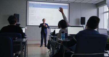 School Students Discussing Computer Science Project Of Classmate In Programming Lesson in School video
