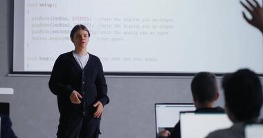 Education Of Future Programmers And IT Professionals In School, Student Boy Talking With Classmates video
