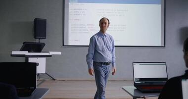 Portrait Of Professional Programmer Man Teaching School Students In School, Programming And Computer video