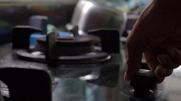 Light household cooking gas with a spark gun. video
