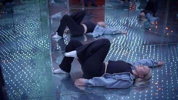Dance performance with mirrors and LED lights, creating a reflective and dynamic show video