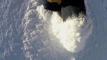A person walks in deep snow in a serene winter landscape, exploring the snowy wilderness video