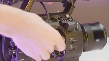 Japan, Tokyo - June 9, 2022. Close-up of cable connection to camera. Action. Manual camera for professional shooting. Connecting cable to camera for filming video