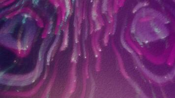 Purple background with fireworks made of sequins. Motion. Light rays of light of different colors made in 3d format. video