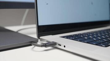 The concept of working on a computer. Action . A new laptop with working connectors and showing a good monitor that turn on for work. video