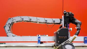 An iron robot working in a factory. Media.Development of equipment that copes without people with heavy materials video