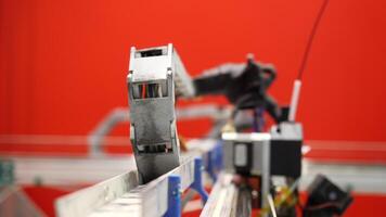 Close-up of mechanism with robotics. Media. Small mechanism at robot exhibition. Automated crawler mechanism video
