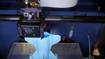 Automated technical 3d printer. Media. 3D printer creates tall object. Large automated 3d printer video