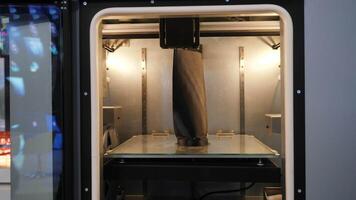 3d printer prints object close-up. Media. Automatic 3D printer machine at work, concept of modern technologies. video