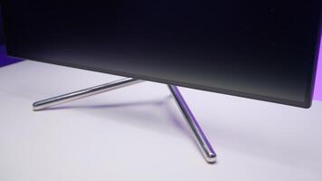 Part of laptop or TV screen. Action. Computer or monitor standing on white table surface. video