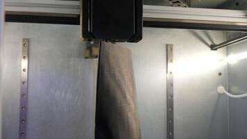 3d printer prints object close-up. Media. Automatic 3D printer machine at work, concept of modern technologies. video