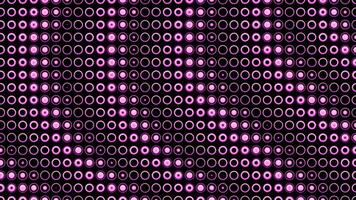 Disco background with lots of dots and pattern. Design. Wavy lines of changing points with rings. Pulsating dots with rings creating pattern of lines video