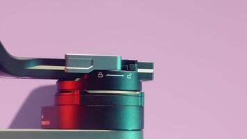 JAPAN, TOKYO - MARCH 21, 2022. Part of the stabilizer. ACTION. The stabilizer is shown rotating along the axis. On a purple background, a part of the stabilizer is removed for shooting video