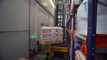 UK, LONDON - December, 2021. Mail warehouse. Creative. A warehouse where people distribute and distribute various large parcels and control the process. video
