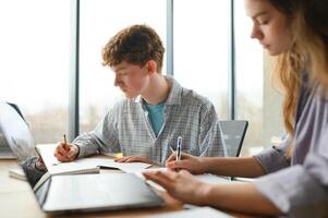 Students studying in library or classroom photo