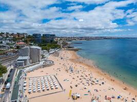 Drone aerial view of Praia da Rainha and historic city centre of Cascais, Portugal photo