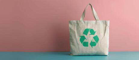 Eco-Friendly Reusable Tote Bag Against Pastel Background photo