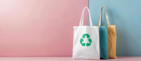 Reusable Bags With Recycle Symbol on Pastel Background photo
