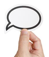Hand holding a blank speech bubble isolated on white background. Template Mockup photo