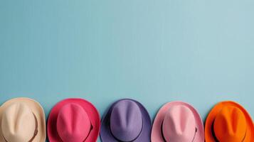 Colorful Straw Hats Arranged Neatly on a Blue Background photo