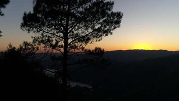 Aerial View of Sunlit Mountain Valleys video