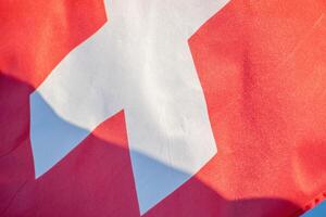 detailed close up of a Swiss flag waving photo