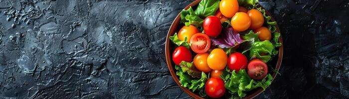 A minimalist composition of a bowl of mixed vegetables, vibrant colors against a dark, textured backdrop, panoramic space above for copy. photo